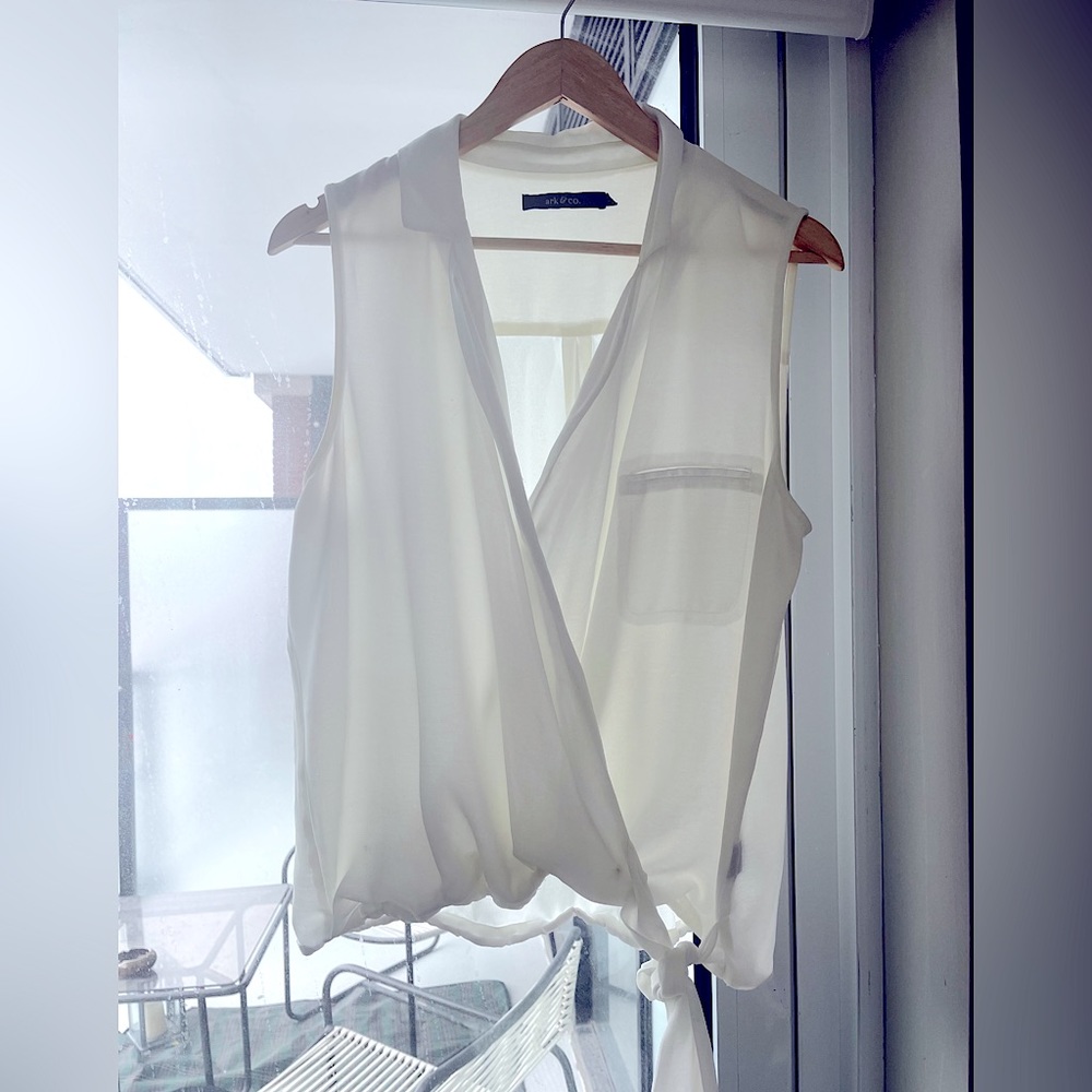 White sleeveless shirt- size L